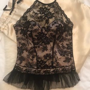 La Perla corset. Never been worn- new. Black and pink with lace. Zips up.